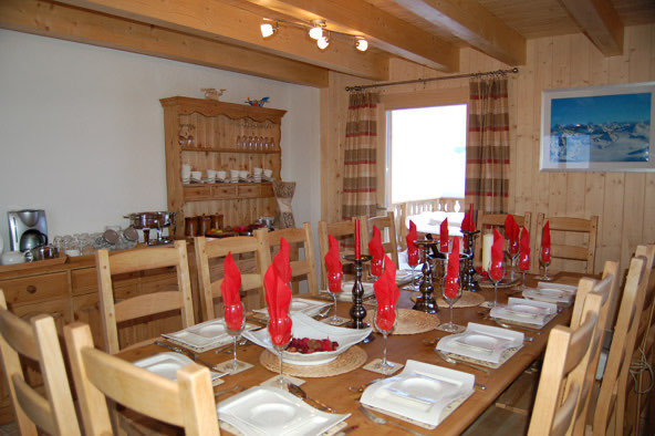 The dining room, set for dinner